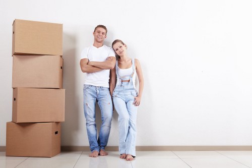 Professional packers organising household belongings for a move in Ealing