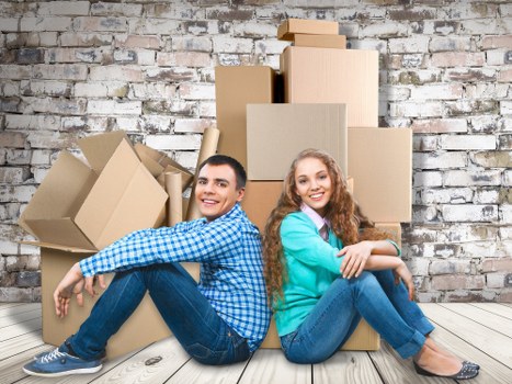 Packed moving boxes inside a removals van for Ealing customers