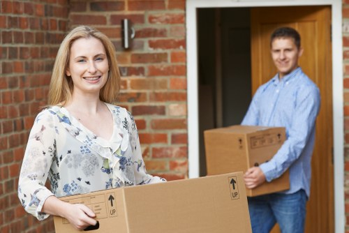 Loading furniture into a van for an Ealing move