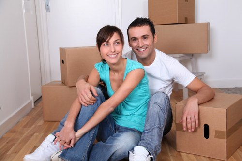 Organised moving day with van loading and household items